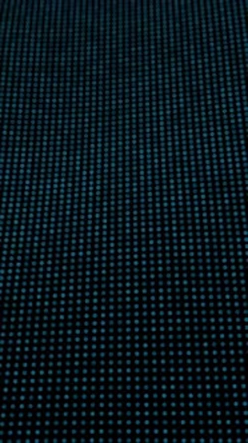 A Captivating Dot Texture Pattern Stands Out Beautifully Against a Dark Background