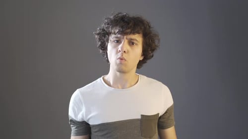 Angry and egoistic young man.