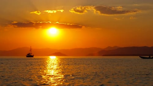 Sunset Boat Scene on Ocean