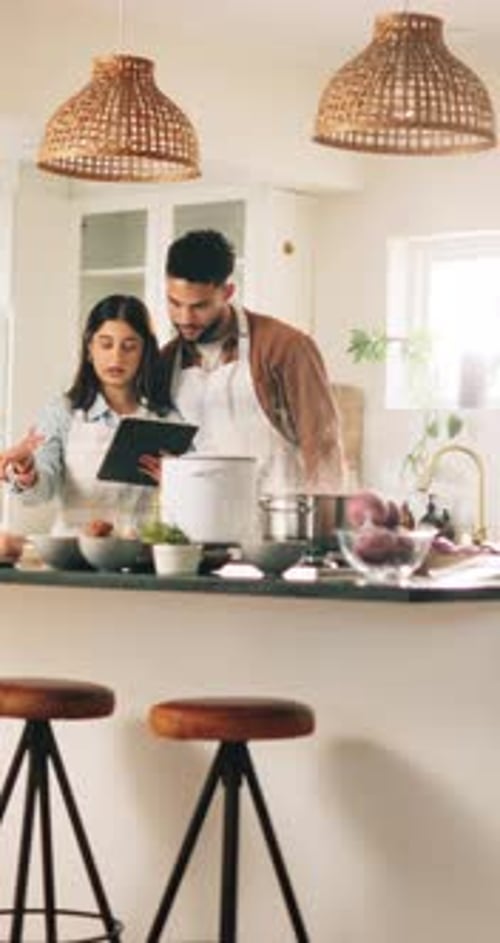 Couple Cooking Together in Modern Kitchen