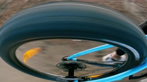 Traveling Along a Dirt Road with Mountain Bike