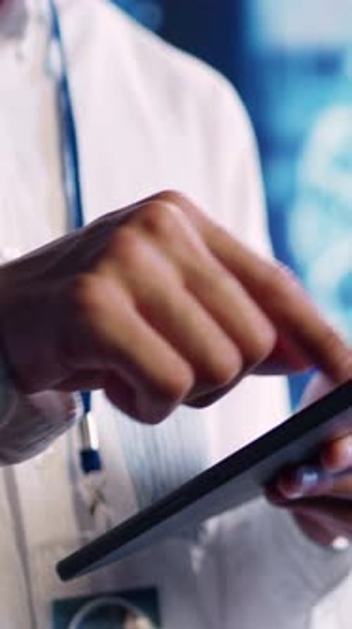 Vertical Video Specialist Doing AI Simulation on Tablet