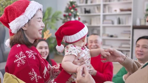 Happy Family Celebrates Christmas Together at Home
