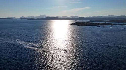 Boats Sailing on the Ocean on a Sunny Day