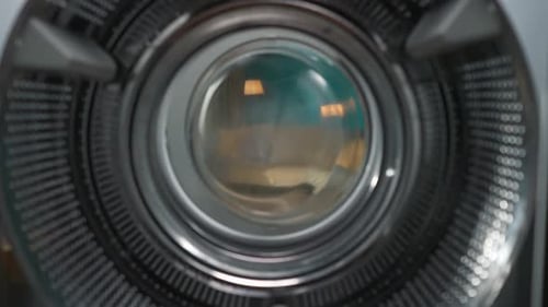 View From Inside the Empty Washing Machine Young Woman Walks Into the Room with Laundry Basket