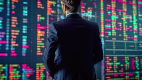 Young Businessman in suit . Wide view exchange and stock market graph growthing up on digital wall