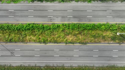 Drone aerial view above new intercity motorway without car.