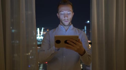 Young Handsome Man Using Tablet Screen on Business Travel