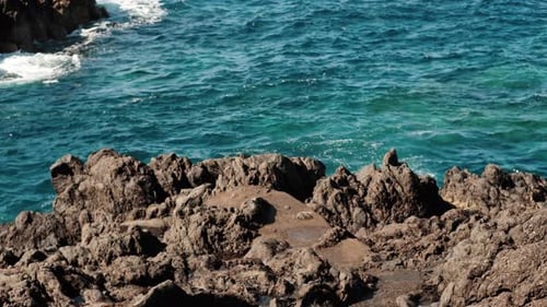 Young Man Go Up on Top of Mountain Summit and Watching Beautiful Ocean Landscape