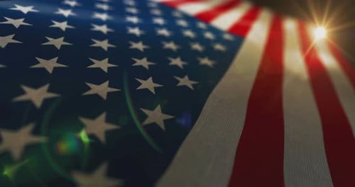 Dynamic Waving American Flag with Sunlight and Flare
