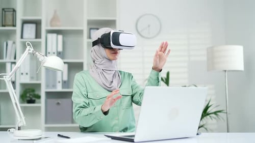 Woman Uses VR Headset in Bright Modern Office