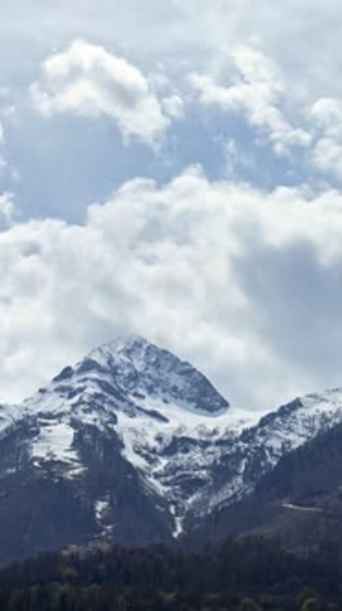 Clouded Sky Highlights Snowy Mountain Terrain Sky Filled With Clouds Over Icy Mountain Peaks Cloudy