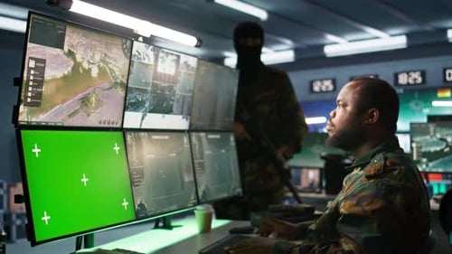 Soldier in Military HQ Base Using Green Screen Equipment