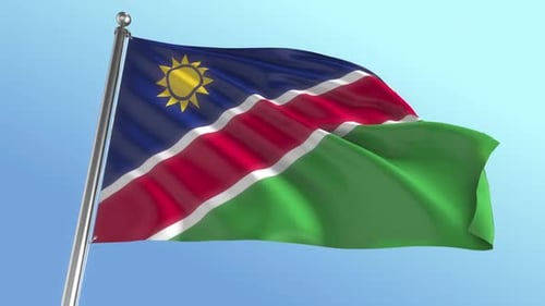 Realistic Namibia Flag Waving Against Blue Sky