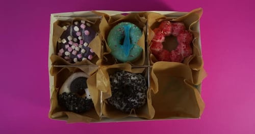 Placing Donut into Delivery Box