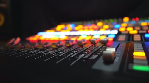 Close Up of Moving Buttons on Dj Remote or Soundboard Working Process in Recording Studio Blurred