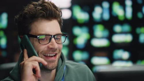 Happy Developer Talking Smartphone at Night Datacenter Closeup Man Ending Call