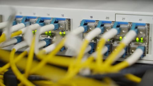 Optical Server and Router of the Data Center Server Room Network Equipment Blinking with Lights on