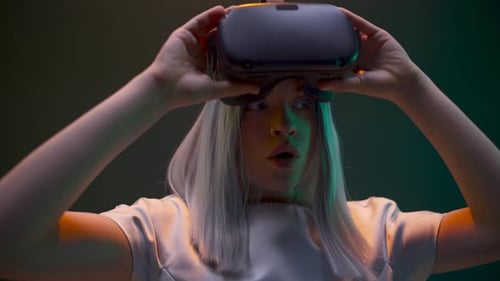 Young Woman Experiencing Virtual Reality with VR Headset