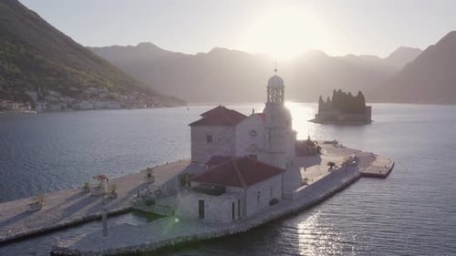 Aerial view of Kotor Bay with church at sunrise, Montenegro.