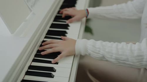 Young Adult Playing Piano