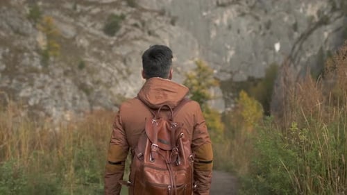 Hiker Tourist Traveler Man with Backpack at Mountains Outdoors River Hiking Travel Landscape Nature