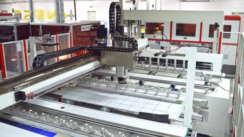Robotic equipment for producing solar panels.