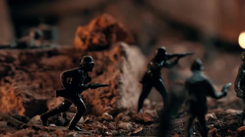 Miniature toy soldiers simulating a war battlefield