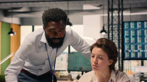 Diverse Business Team Collaborating on Reporting Data Analysis Professional Office