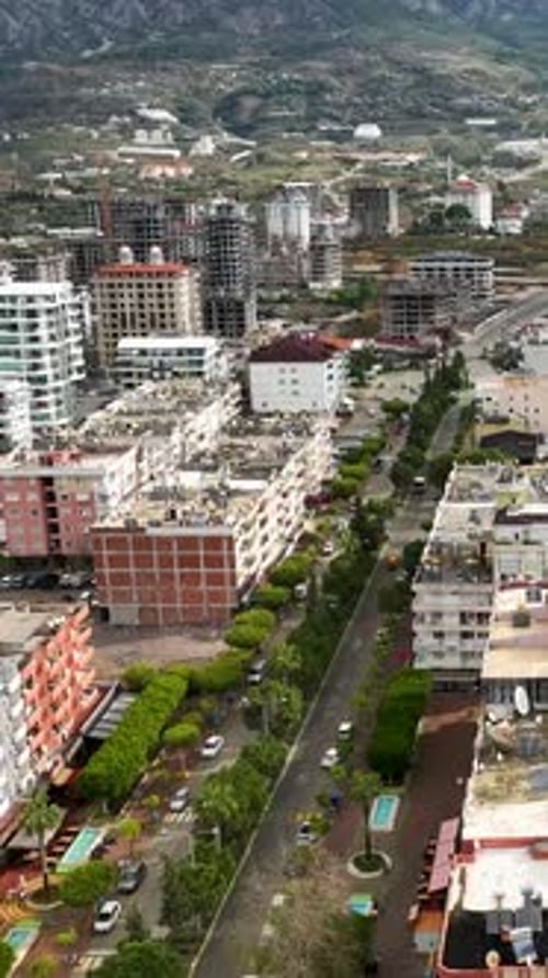 Vertical Video Above the Storm Aerial View of Beautiful Mediterranean Coastline and City Panorama