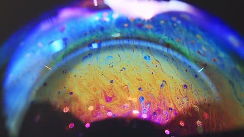 Abstract Liquid Rainbow Patterns Inside a Soap Bubble