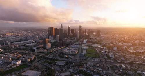 Epic Los Angeles downtown view on pink cinematic sunset.