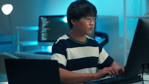 Software engineer programming code debugging and development task in professional