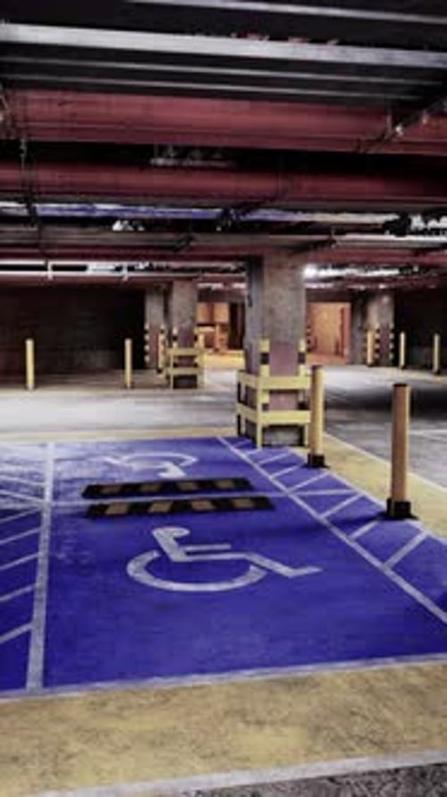 Modern Empty Parking Garage with Handicapped Spot