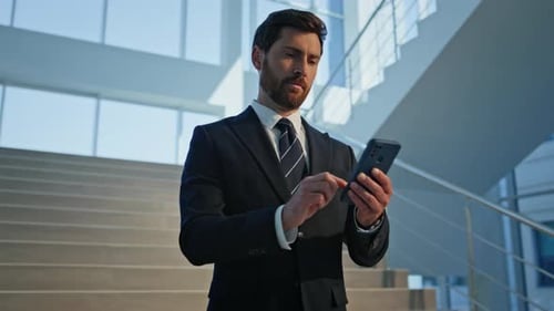 Businessman Using Smartphone Stairs Inside Modern Office Building Closeup