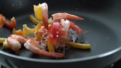 Stir Fry Splashing Into Hot Oil in Frying Pan, ;