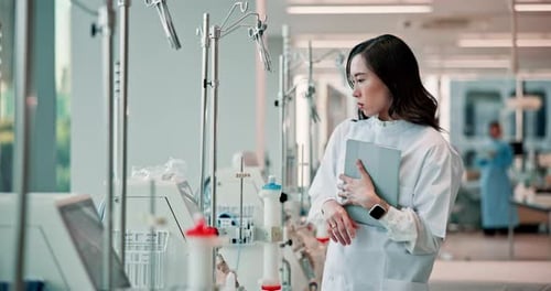 Doctor, woman and check for dialysis equipment with tablet, click or inspection in hospital