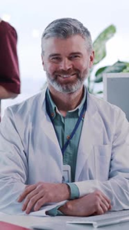 Smiling Doctor in Lab Coat Portrait