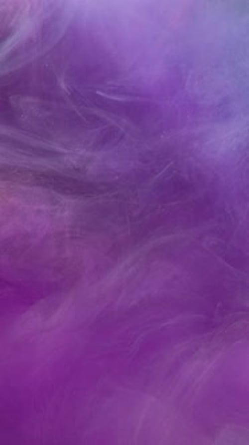 Abstract Swirling Purple and White Nebulous Motion
