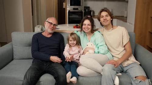 Family Portrait on the Sofa in the Living Room