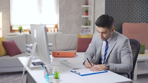 Freelance businessman in his home office.