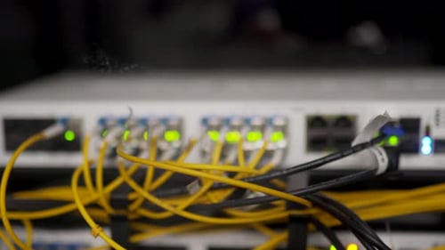 Optical Server and Router of the Data Center Server Room Network Equipment Blinking with Lights on