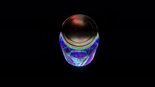 Glass Jar Rotates on a Black Isolated Background