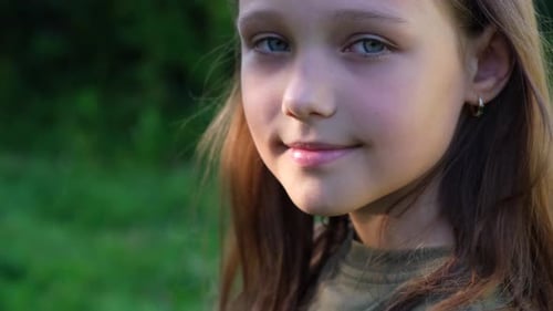 Close Up Of A Young Girl In Nature