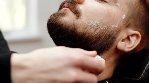 Beard Shave Prep in Barber Shop Close Up