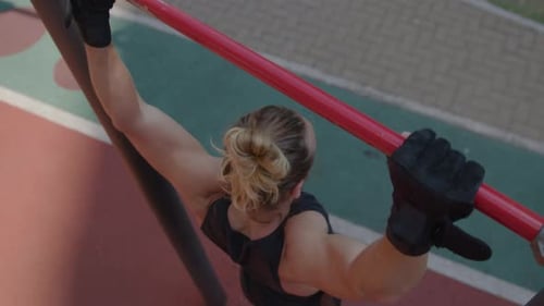 Top View of Athlete Doing Pull Ups during Street Workout