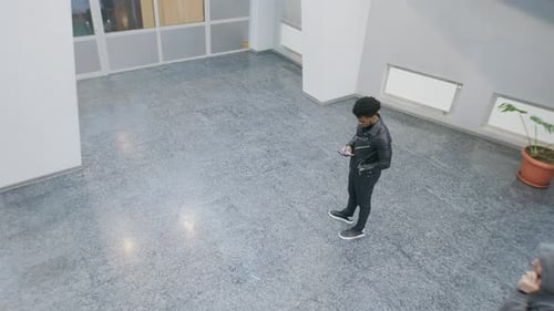 People Walking at College Lobby
