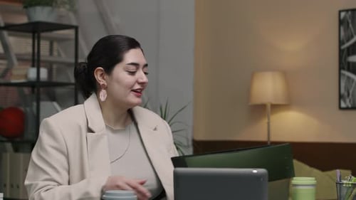 Young Diverse Group of Programmers Starting Team Meeting in Office