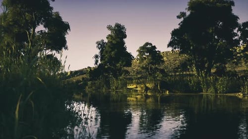 Peaceful Dusk Reflections on Quiet River with Distant Tree Line
