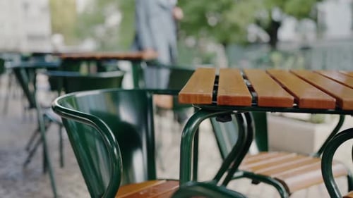Outdoor Cafe Seating Arrangement on a Sunny City Street